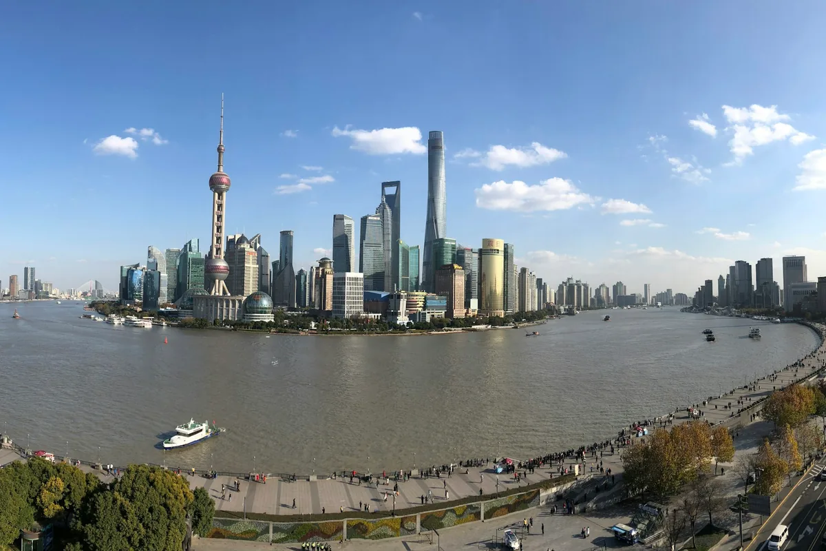 Shanghai skyline and Oriental Pearl Tower across the Huangpu River